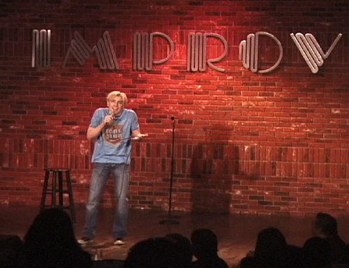 Scotch Wichmann on stage at the Improv